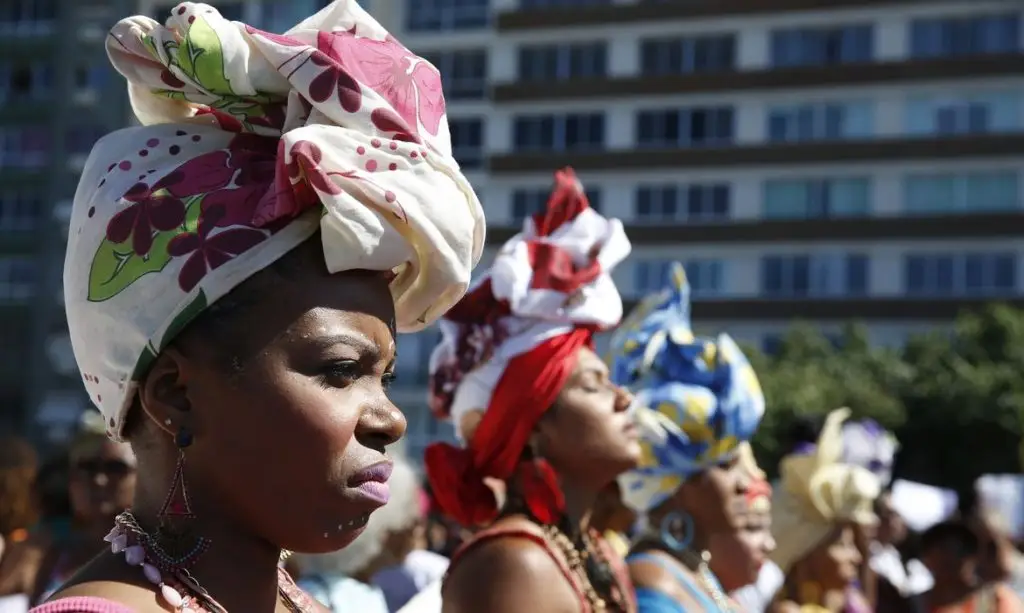 Mulheres marcham em Copacabana para celebrar dia da Mulher Negra Latino-americana e Caribenha durante a 3ª Marcha das Mulheres Negras no Centro do Mundo